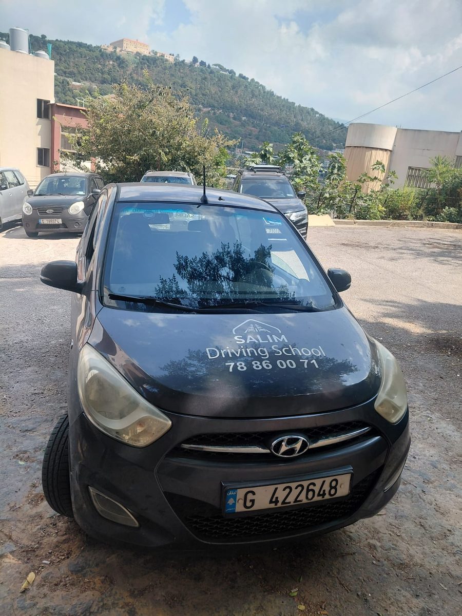 Salim Driving School training car on a mountain road in Keserwan